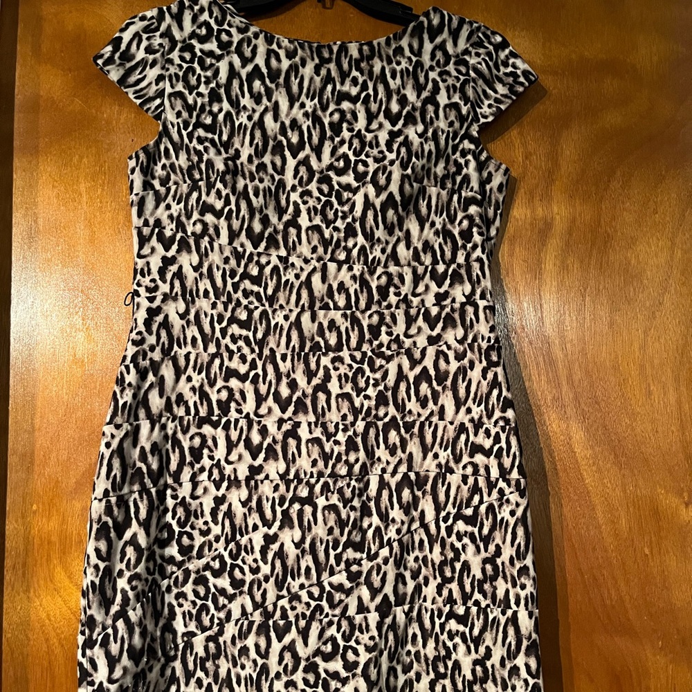 Leopard print business dress.